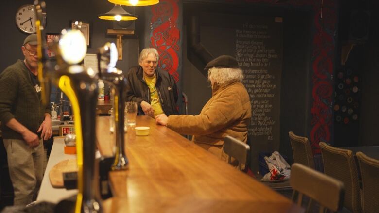 (From left) Rhys Davies, Dafydd Rhys, and Kenny Richards are part of the nearly 75% of people in Gwynedd County who speak Welsh. Caernarfon, the small North Wales town in which they live is one of the most Welsh-speaking places in the world. 