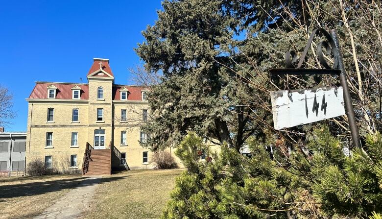 A photo of a historic building in Saint Jean Baptiste, Man. 144 Caron Street.