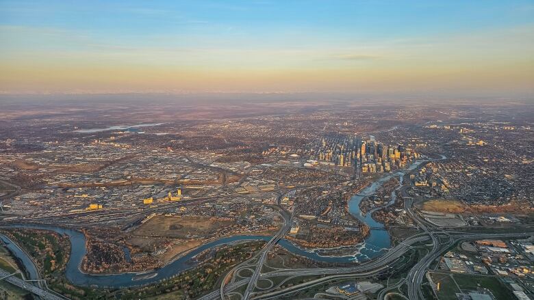 An view of Calgary's downtown at sunrise from the air