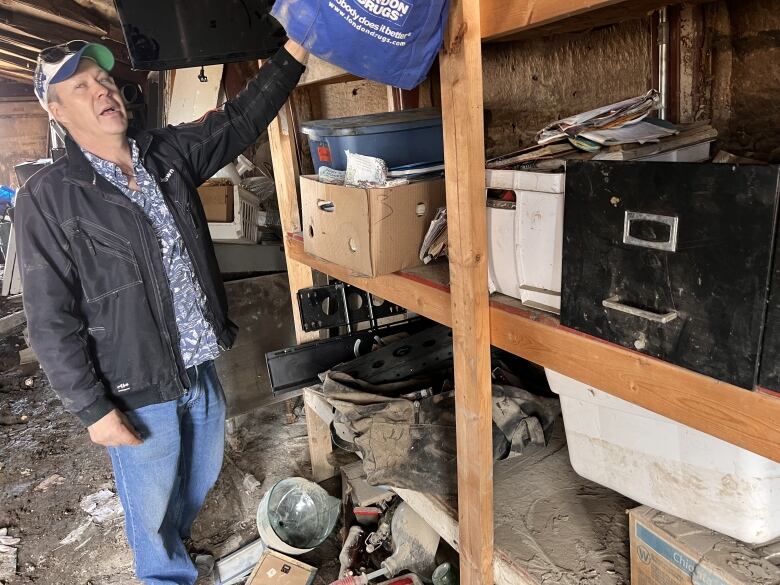 Man in shed. 