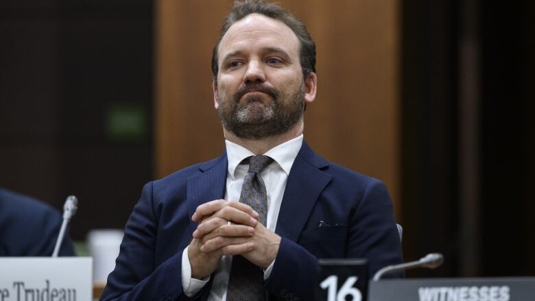 Alexandre Trudeau, brother of Prime Minister Justin Trudeau and member of the Pierre Elliott Trudeau Foundation, prepares to appear before the Parliamentary standing committee on access to information, privacy and ethics, studying foreign interference, on Parliament Hill in Ottawa on Wednesday, May 3, 2023.