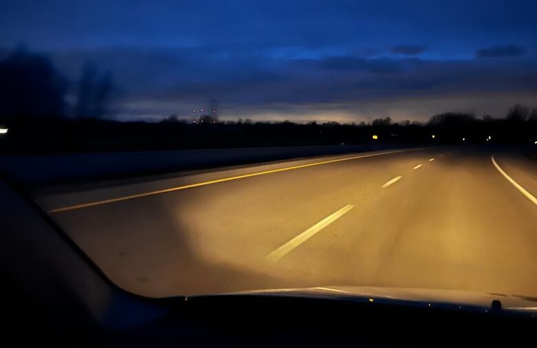 Highway 15 seen at night from the inside of a car.