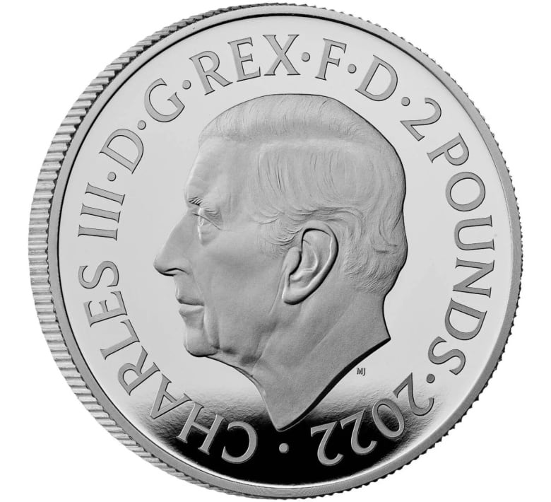 An image of a coin depicting the likeness of King Charles III.