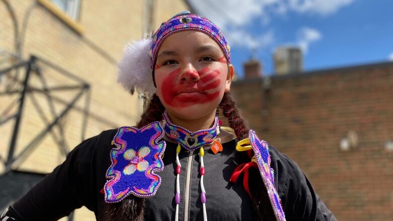 dancing jingle at Newo-Yotina Friendship Centre event to observe National Red Dress day on May 5th.