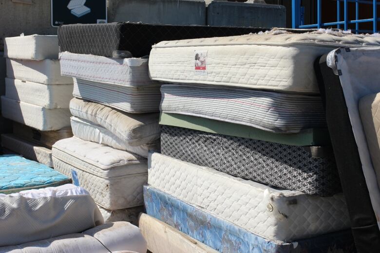 A stack of mattresses is pictured at the Banff waste transfer site.