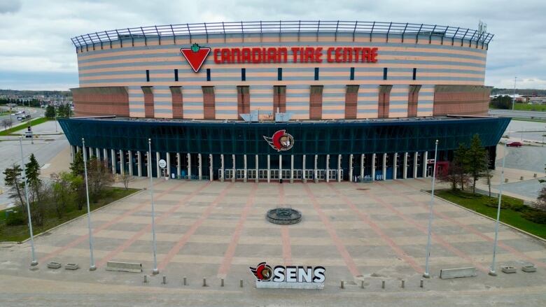 The quiet outside of a hockey arena in spring.