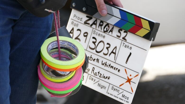 A ZARQA clapperboard. 