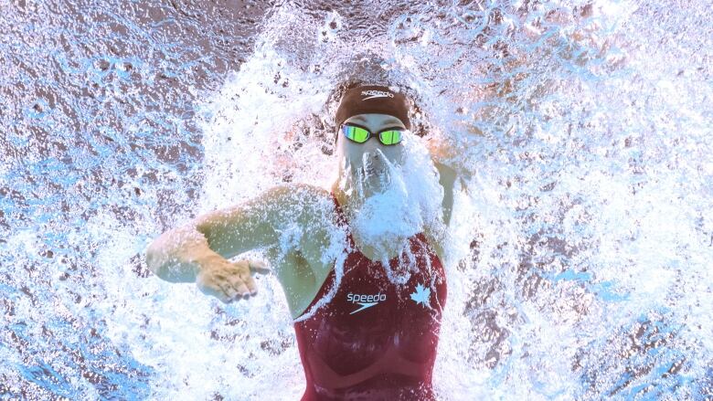 Canadian swimmer Penny Oleksiak is seen in an underwater shot.