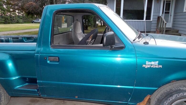 Photo of a blue truck.