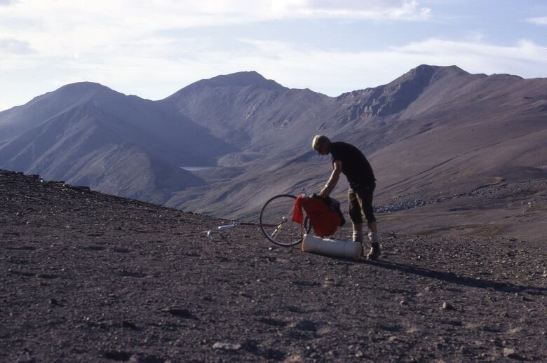 Brian Patton is pictured with his trail wheel doing fieldwork on the Skyline Trail in Jasper National Park in 1970. 