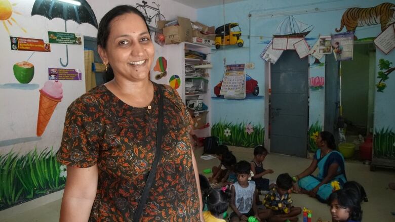 Savitha Narayanamurthy takes numerous measurements at precise hours of the day to monitor how the growing rooftop garden on top of this daycare centre building is lowering the indoor temperature.