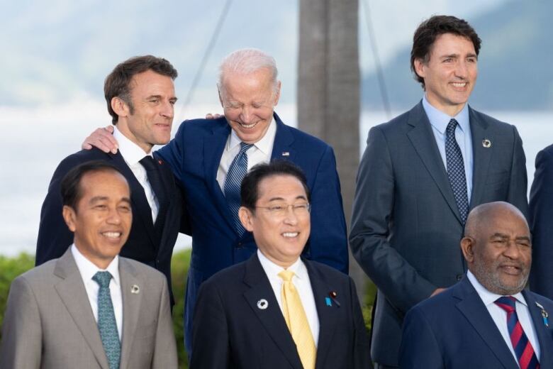 World leaders pose for a photo.