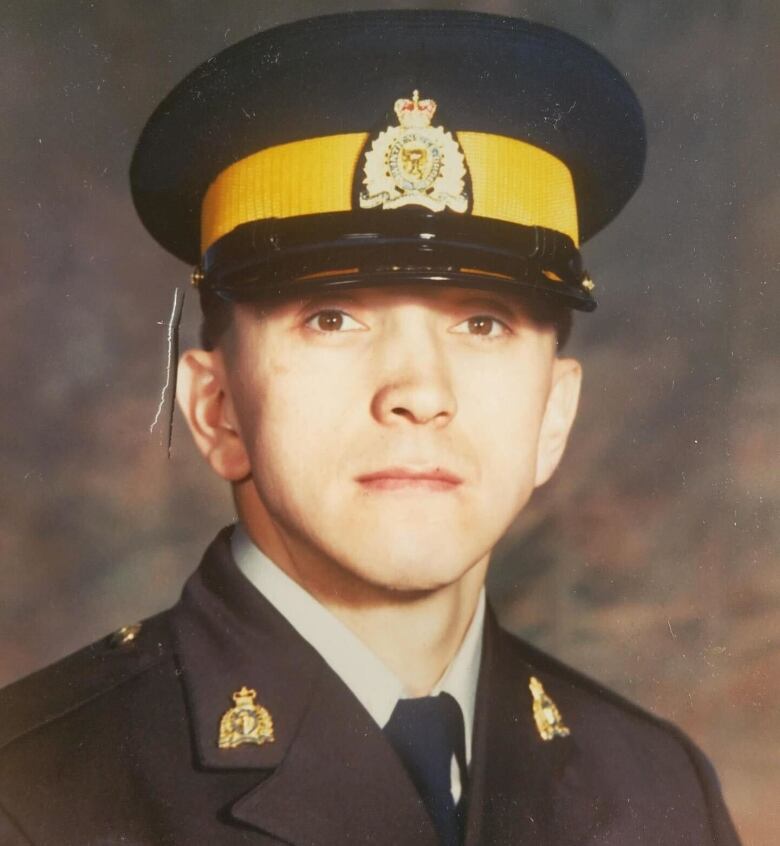 Man standing in an RCMP uniform 