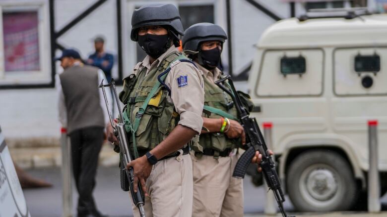 Indian paramilitary soldiers keeping guard at a newly-renovated market ahead of the visit of G20 Delegates in Srinagar, Indian controlled Kashmir, Wednesday, May 24, 2023. The meeting condemned by China and Pakistan is the first significant international event in Kashmir since New Delhi stripped the Muslim-majority region of semi-autonomy in 2019. 