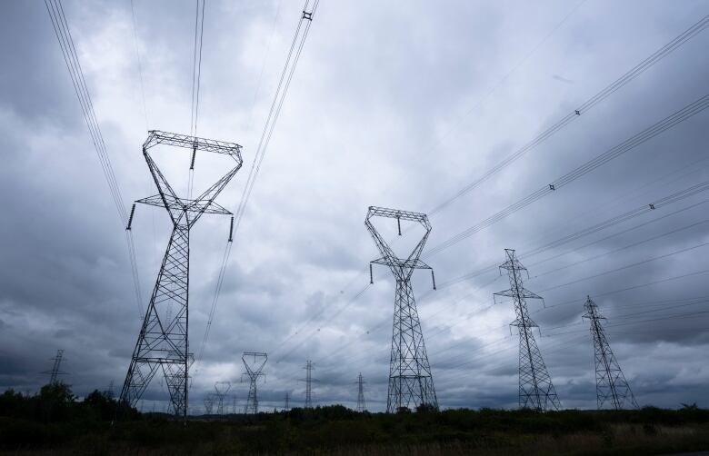 Power lines are seen against cloudy skies near Kingston, Ont. , Wednesday, Sept. 7, 2022 in Ottawa. 