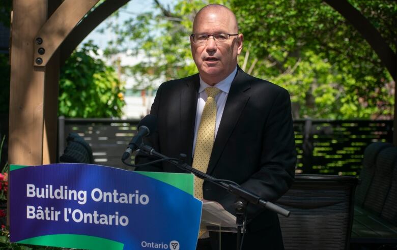 A man standing at a podium.