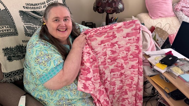 Yvonne Campbell of Glace Bay says local hospitals have not had johnny shirts large enough to fit her, so she's made her own.