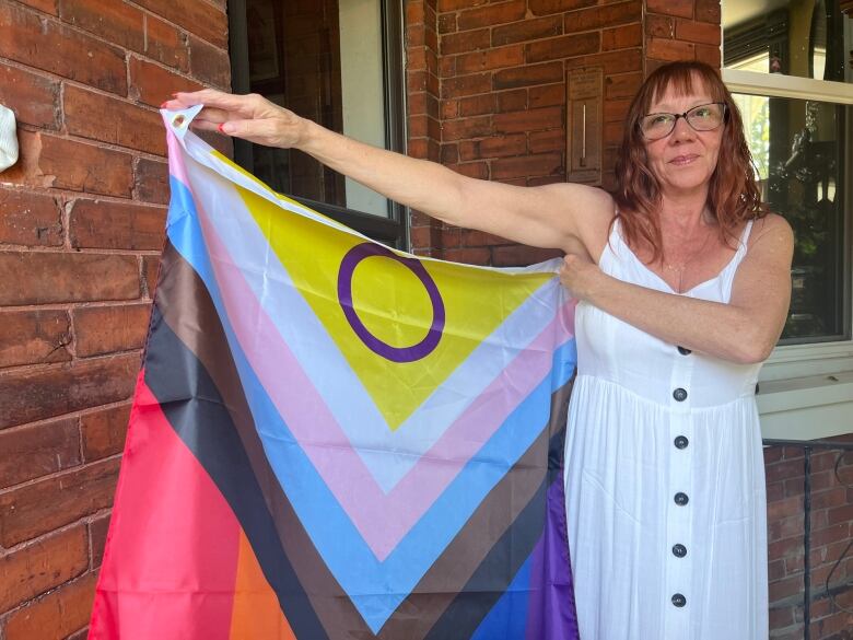 Heather Pember said the debate over the flags has left the community of Norwich divided.