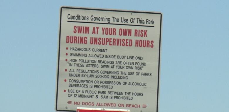 Warning sign posted at Sandpoint Beach.