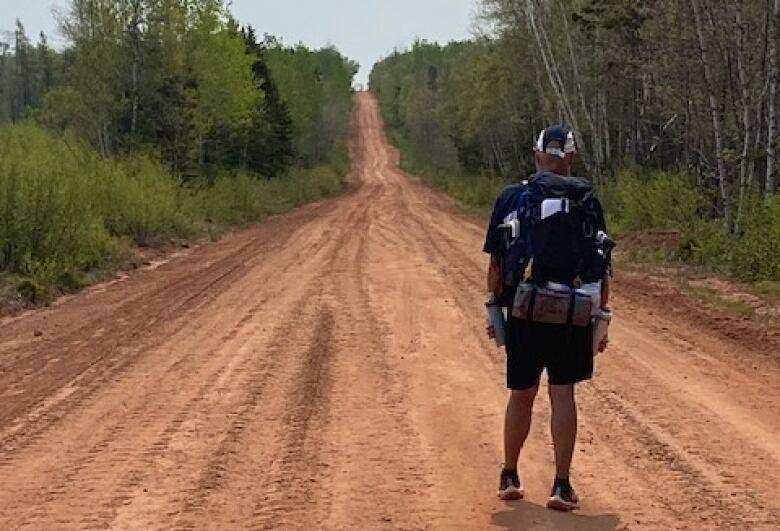 Martin Denonville walks on a P.E.I. trail. 