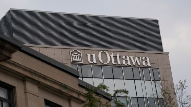 A building with a uOttawa sign on top.