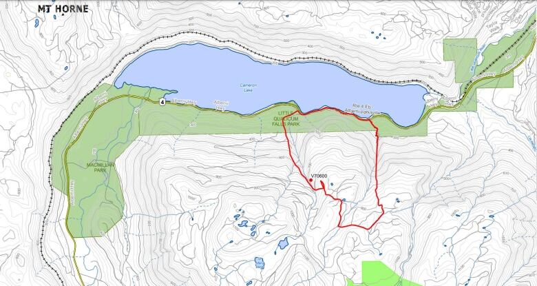 A topographical map with a red outline of a wildfire that started about 1 km south of Cameron Lake bc, and blocked the east-west highway along the lakeshore.