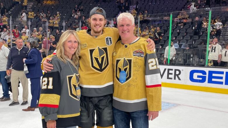 A family poses together for a photo