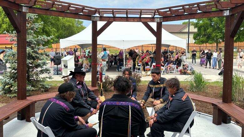 A drum circle performing during the opening of Southwest Ontario Aboriginal Health Access Centre's new clinic in Cambridge.