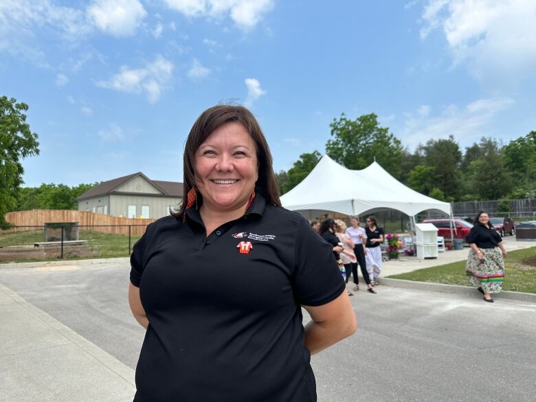 Charisse Sayer, the integrated care manager for SOAHAC, posing for a photo after the ceremony on Tuesday.