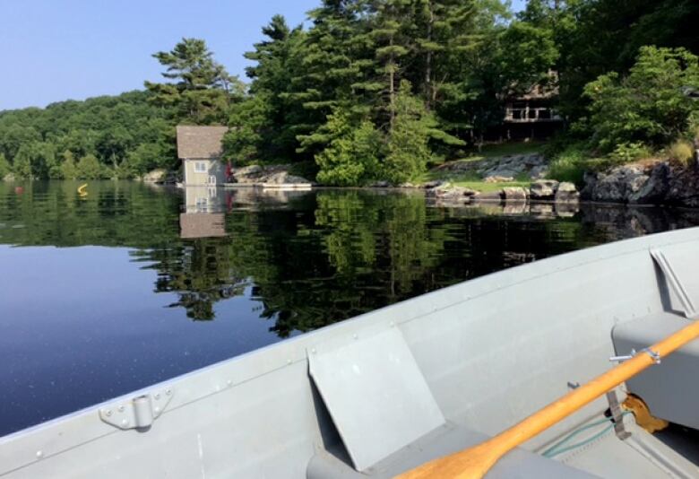 A view of a lake front from a boat.