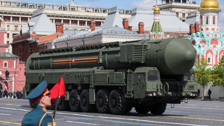 An intercontinental ballistic missile system drives moves through Moscow's Red Square during a military parade.