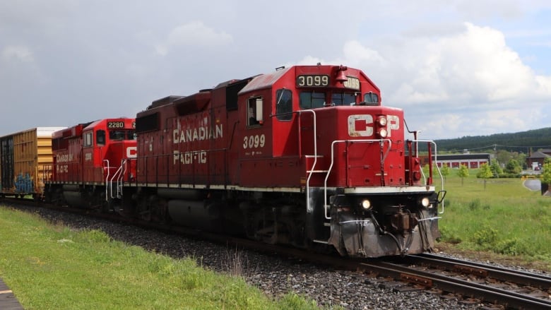 A red train on a track