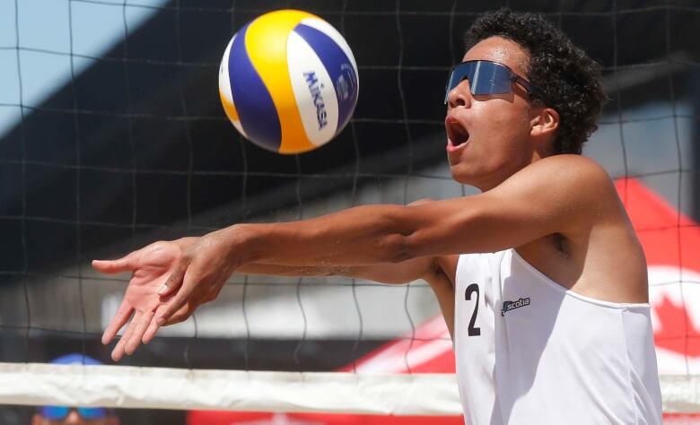 Tynan Gannett playing volleyball