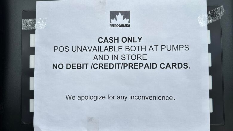 A sign on a gas pump at Petro-Canada in Toronto