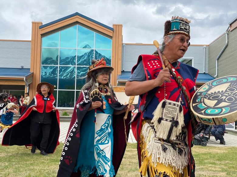 dancers in indigenous regalia