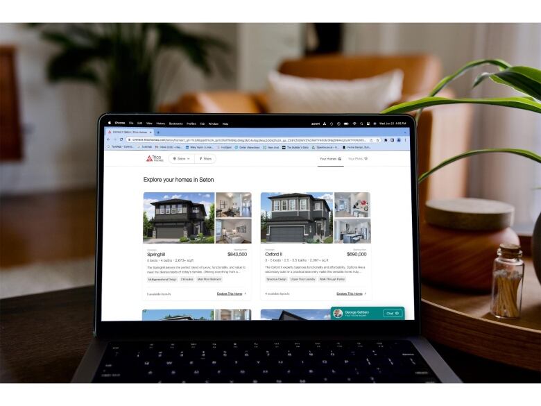 A laptop screen displays home recommendations in Seton, Calgary.
