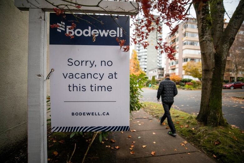 A sign outside a Vancouver apartment building indicates no vacancy.