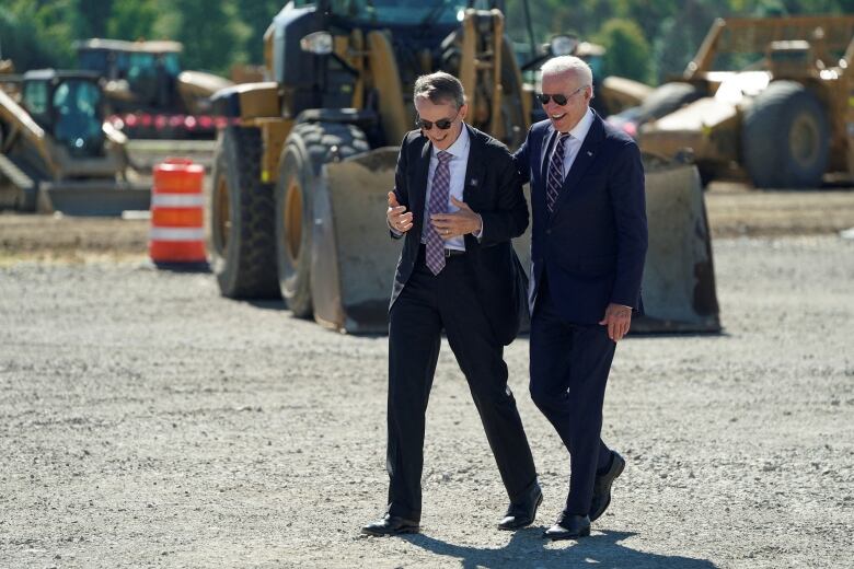 Biden in sunglasses on a construction site