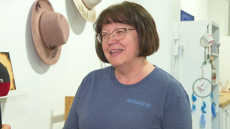 Yvette McKenna, general manager of Indigenous P.E.I., standing in store. 