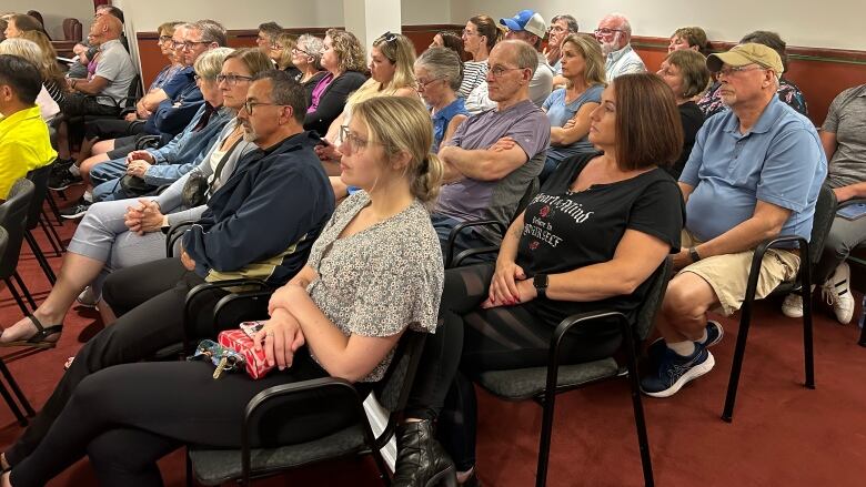 Over 50 residents sitting inside the chamber at a Summerside City Council meeting.