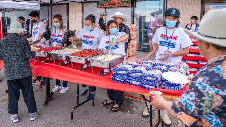 food and people are pictured.