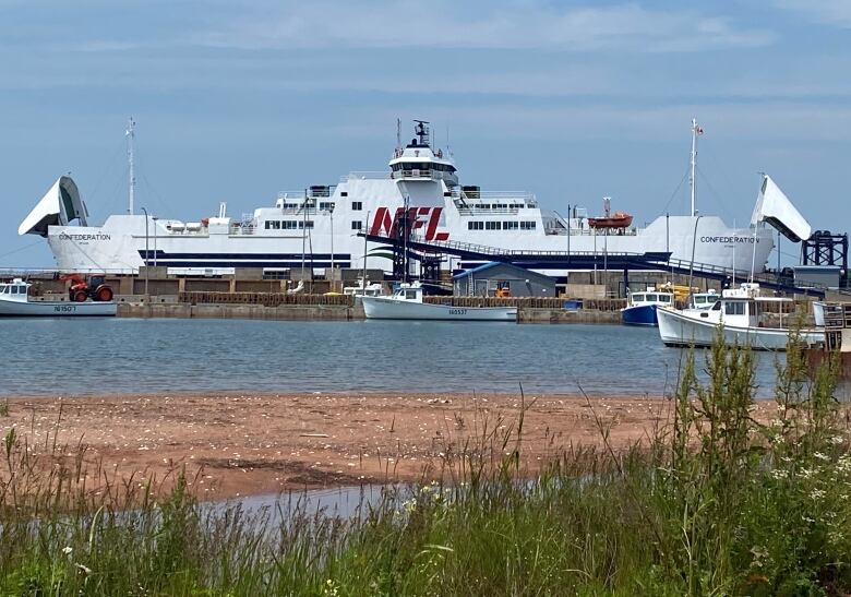 Confederation ferry at the dock in Wood Islands, with both vehicle bay doors up.