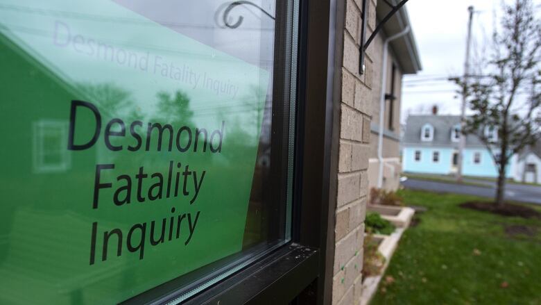 A Desmond Fatality Inquiry sign