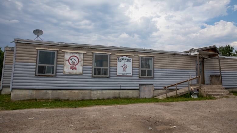 A grey and brown building.