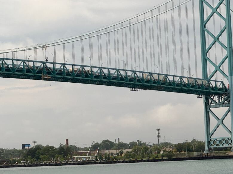 The Ambassador Bridge is shown approximately four hours after a worker fell from the crossing into the Detroit River.