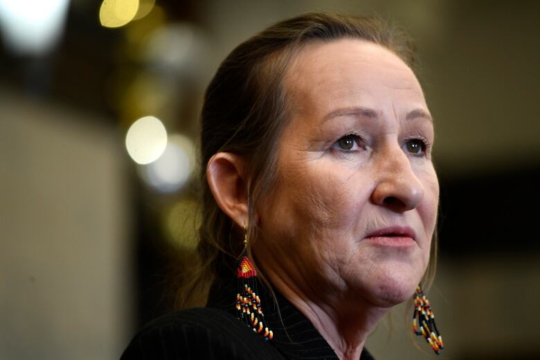 Premier of the Northwest Territories Caroline Cochrane participates in an availability after speaking with Prime Minister Justin Trudeau, not shown, on Parliament Hill in Ottawa, on Friday, Dec. 9, 2022.