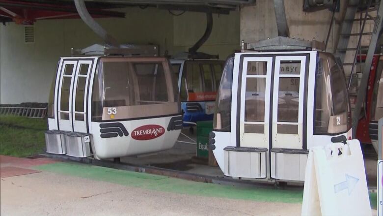 Two gondolas remain docked.