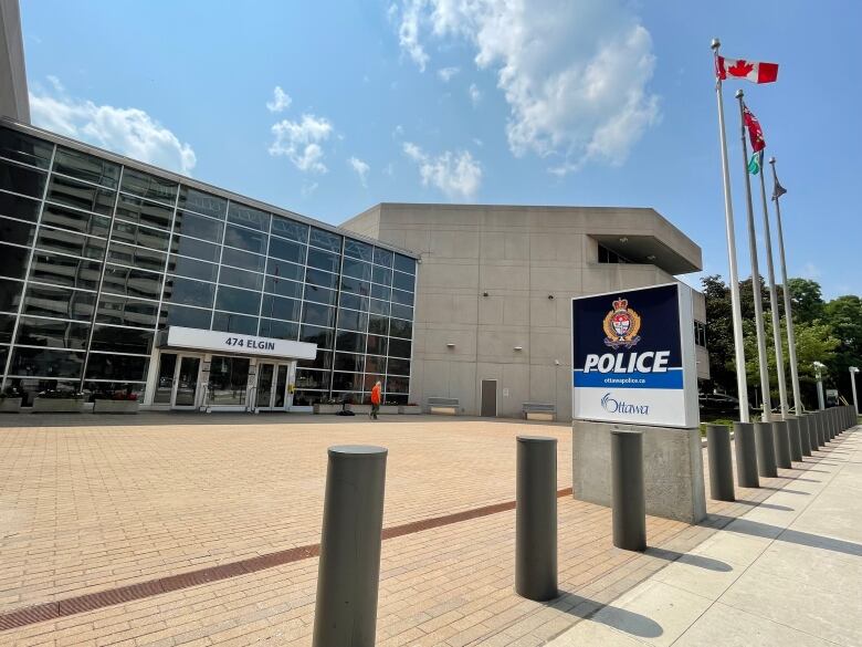 A police station front entrance in summer.