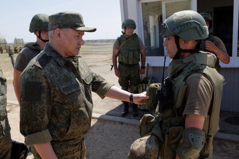 Russia's Defence Minister Sergei Shoigu inspects troops at a shooting range in an unknown location in the country's Southern Military District, in the course of Russia-Ukraine conflict, in this image released July 8, 2023.