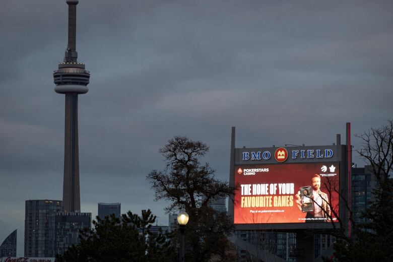 A billboard promoting an online gambling service is seen on a Toronto billboard in November 2022.